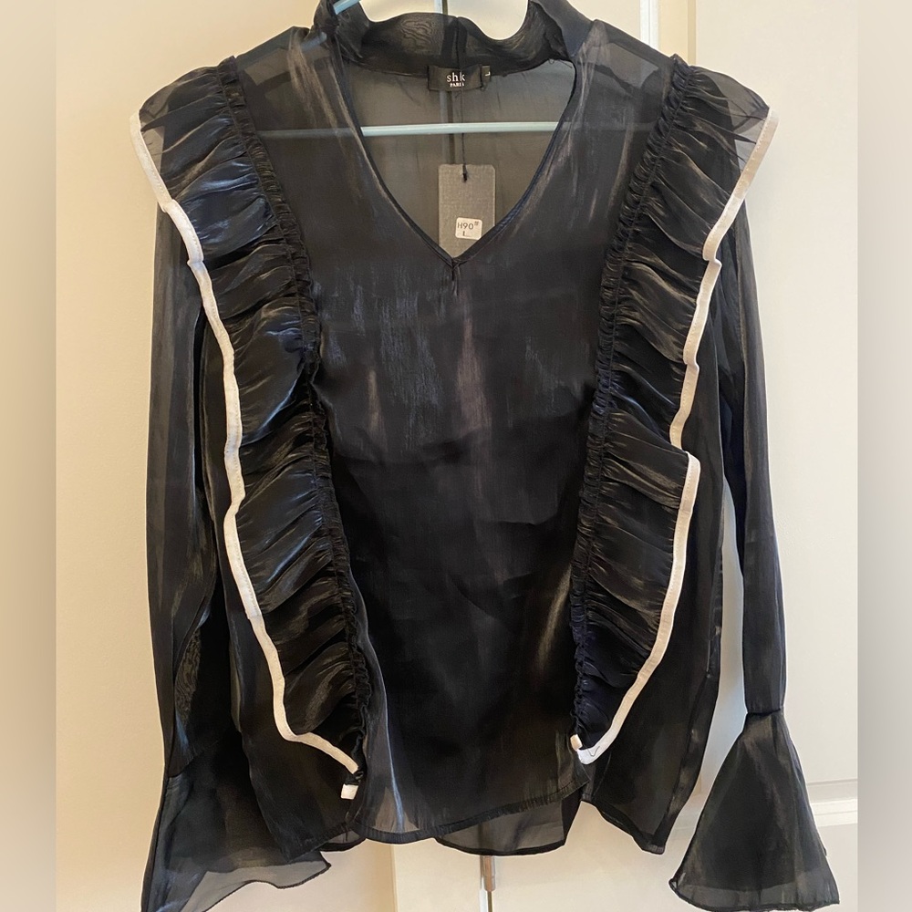 Chiffon black blouse in large. Never worn.
